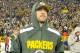 Nov 4, 2013; Green Bay, WI, USA; Green Bay Packers quarterback Aaron Rodgers (12) walks off the field after the Chicago Bears beat the Green Bay Packers 27-20 at Lambeau Field. Rodgers left the game early in the 1st quarter with a left shoulder injury. Mandatory Credit: Benny Sieu-USA TODAY Sports