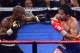 Jun. 9, 2012; Las Vegas, NV, USA; Timothy Bradley Jr (left) against Manny Pacquiao during a welterweight championship bout at the MGM Grand Garden Arena. Mandatory Credit: Mark J. Rebilas-USA TODAY Sports