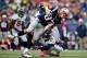 FOXBORO, MA - OCTOBER 7: Rob Gronkowski #87 of the New England Patriots gains yardage against the Denver Broncos at Gillette Stadium on October 7, 2012 in Foxboro, Massachusetts. (Photo by Jim Rogash/Getty Images)