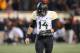 STILLWATER, OK - NOVEMBER 23: Bryce Petty #14 of the Baylor Bears walks off the field after Tyler Patmon #26 of the Oklahoma State Cowboys returned a fumble for a touchdown in the fourth quarter at Boone Pickens Stadium on November 23, 2013 in Stillwater, Oklahoma. (Photo by Ronald Martinez/Getty Images)