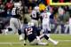 FOXBORO, MA - NOVEMBER 24: Quarterback Tom Brady #12 of the New England Patriots sits on the field after a play in the first quarter against the Denver Broncos during a game at Gillette Stadium on November 24, 2013 in Foxboro, Massachusetts. (Photo by Jim Rogash/Getty Images)