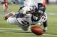 Nov 24, 2013; Foxborough, MA, USA; Denver Broncos running back Montee Ball (28) dives for a fumble during the third quarter against the New England Patriots at Gillette Stadium. Mandatory Credit: Stew Milne-USA TODAY Sports