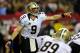 Nov 21, 2013; Atlanta, GA, USA; New Orleans Saints quarterback Drew Brees (9) calls a play against the Atlanta Falcons during the second half at the Georgia Dome. The Saints defeated the Falcons 17-13. Mandatory Credit: Dale Zanine-USA TODAY Sports