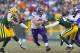Nov 24, 2013; Green Bay, WI, USA; Minnesota Vikings running back Toby Gerhart (32) rushes with the football during overtime against the Green Bay Packers at Lambeau Field. The Vikings and Packers tied 26-26. Mandatory Credit: Jeff Hanisch-USA TODAY Sports