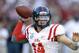 Sep 28, 2013; Tuscaloosa, AL, USA; Mississippi Rebels quarterback Bo Wallace (14) passing against the Alabama Crimson Tide during the first quarter at Bryant-Denny Stadium. Mandatory Credit: John David Mercer-USA TODAY Sports
