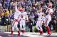 Nov 23, 2013; Manhattan, KS, USA; Oklahoma Sooners quarterback Trevor Knight (9) celebrates after scoring a touchdown against the Kansas State Wildcats during the first half at Bill Snyder Family Stadium. Mandatory Credit: Jasen Vinlove-USA TODAY Sports