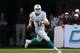 MIAMI GARDENS, FL - NOVEMBER 24: Ryan Tannehill #17 of the Miami Dolphins passes during a game against the Carolina Panthers at Sun Life Stadium on November 24, 2013 in Miami Gardens, Florida. (Photo by Mike Ehrmann/Getty Images)
