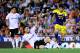 VALENCIA, SPAIN - SEPTEMBER 19: Alejandro Pozuelo of Swansea City duels for the ball with Javi Fuego of Valencia CF during the UEFA Europa League Group A match between Valencia CF and Swansea City at Estadi de Mestalla on September 19, 2013 in Valencia, Spain. (Photo by David Ramos/Getty Images)