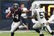 HOUSTON, TX - NOVEMBER 17: Ben Tate #44 of the Houston Texans fends off Nick Roach #53 of the Oakland Raiders as he rushes in the first half at Reliant Stadium on November 17, 2013 in Houston, Texas. (Photo by Bob Levey/Getty Images)
