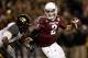 COLLEGE STATION, TX - NOVEMBER 24: Johnny Manziel #2 of the Texas A&M Aggies runs away from the tackle of Kony Ealy #47 of the Missouri Tigers at Kyle Field on November 24, 2012 in College Station, Texas. (Photo by Scott Halleran/Getty Images)