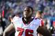 Nov 3, 2013; Charlotte, NC, USA; Atlanta Falcons tackle Lamar Holmes (76) on the sidelines in the third quarter. The Panthers defeated the Falcons 34-10 at Bank of America Stadium. Mandatory Credit: Bob Donnan-USA TODAY Sports