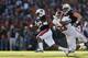 AUBURN, AL - NOVEMBER 30: Tre Mason #21 of the Auburn Tigers tries to avoid the tackle of Trey DePriest #33 of the Alabama Crimson Tide in the first quarter at Jordan-Hare Stadium on November 30, 2013 in Auburn, Alabama. (Photo by Kevin C. Cox/Getty Images)