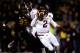 COLUMBIA, MO - NOVEMBER 30: Quarterback Johnny Manziel #2 of the Texas A&M Aggies scrambles as defensive lineman Markus Golden #33 of the Missouri Tigers persues during the game on November 30, 2013 in Columbia, Missouri. (Photo by Jamie Squire/Getty Images)