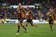 HULL, ENGLAND - DECEMBER 01: David Meyler (L) of Hull City celebrates scoring his team's second goal with team mates during the Barclays Premier League match between Hull City and Liverpool at KC Stadium on December 1, 2013 in Hull, England. (Photo by Matthew Lewis/Getty Images)