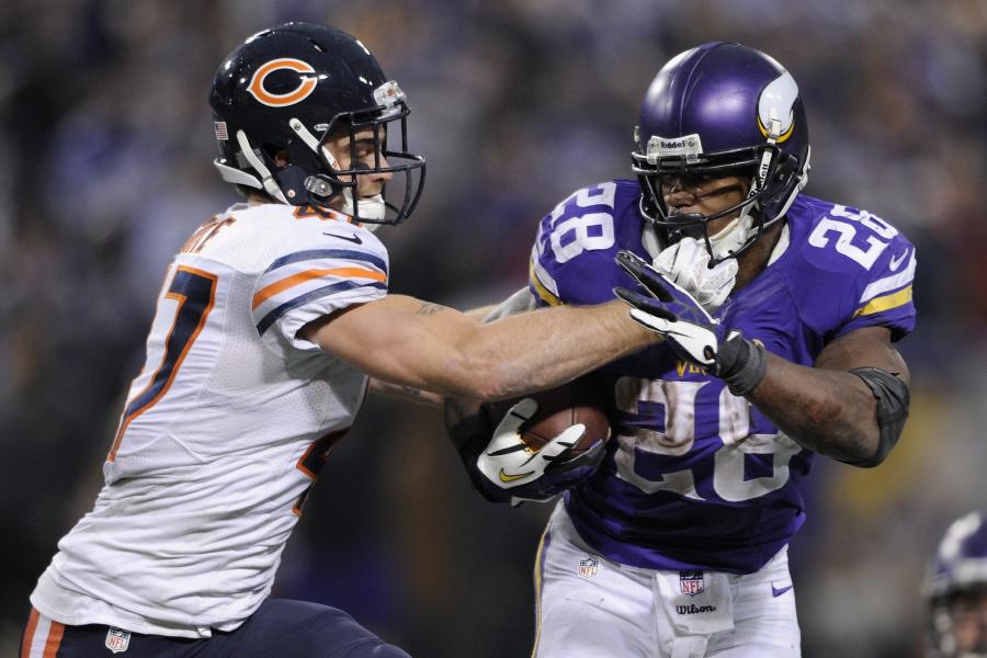 Minnesota Vikings running back Adrian Peterson runs for a gain during the  fourth quarter against the Chicago Bears at Soldier Field in Chicago on  December 28, 2009. The Bears won 36-30 in