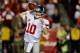 Eli Manning leads the Giants past the Redskins with a strong performance, despite a second half interception.