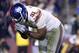 Dec 1, 2013; Landover, MD, USA; New York Giants defensive end Justin Tuck (91) celebrates after making a tackle against the Washington Redskins in the fourth quarter at FedEx Field. The Giants won 24-17. Mandatory Credit: Geoff Burke-USA TODAY Sports