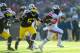 Nov 30, 2013; Ann Arbor, MI, USA; Ohio State Buckeyes running back Carlos Hyde (34) runs the ball during the third quarter against the Michigan Wolverines at Michigan Stadium. Mandatory Credit: Andrew Weber-USA TODAY Sports