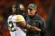 STILLWATER, OK - NOVEMBER 23: Head coach Art Briles talks to Shock Linwood #32 of the Baylor Bears in the first quarter against the Oklahoma State Cowboys at Boone Pickens Stadium on November 23, 2013 in Stillwater, Oklahoma. (Photo by Ronald Martinez/Getty Images)