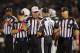 OAKLAND, CA - OCTOBER 06: The officiating crew, including line judge Jeff Bergman #32, referee Jeff Triplette #42, back judge Steve Freeman, and umpire Butch Hannah #40 discuss a play between the San Diego Chargers and the Oakland Raiders in the third quarter on October 06, 2013 at O.co Coliseum in Oakland, California. The Raiders won 27-17. (Photo by Brian Bahr/Getty Images)