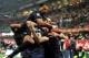 MILAN, ITALY - OCTOBER 26: Rodrigo Palacio of FC Inter Milan is surrounded in congratulation by team-mates after scoring their team's second goal during the Serie A match between FC Internazionale Milano and Hellas Verona at Stadio Giuseppe Meazza on October 26, 2013 in Milan, Italy. (Photo by Claudio Villa/Getty Images)
