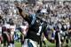 Dec 1, 2013; Charlotte, NC, USA; Carolina Panthers quarterback Cam Newton (1) celebrates after a touchdown during the game against the Tampa Bay Buccaneers at Bank of America Stadium. Mandatory Credit: Sam Sharpe-USA TODAY Sports