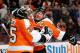 PHILADELPHIA, PA - NOVEMBER 09: Claude Giroux #28 of the Philadelphia Flyers celebrates the win with Steve Mason #35 after the game against the Edmonton Oilers at Wells Fargo Center on November 9, 2013 in Philadelphia, Pennsylvania.The Philadelphia Flyers defeated the Edmonton Oilers 4-2. (Photo by Elsa/Getty Images)