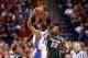 INDIANAPOLIS, IN - MARCH 29: Branden Dawson #22 of the Michigan State Spartans defends against a shot attempt by Rasheed Sulaimon #14 of the Duke Blue Devils in the first half during the Midwest Region Semifinal round of the 2013 NCAA Men's Basketball Tournament at Lucas Oil Stadium on March 29, 2013 in Indianapolis, Indiana. (Photo by Andy Lyons/Getty Images)