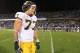 EAST HARTFORD, CT - SEPTEMBER 21: Taylor Lewan #77 of the Michigan Wolverines leaves the field after defeating the Connecticut Huskies at Rentschler Field on September 21, 2013 in East Hartford, Connecticut. (Photo by Jim Rogash/Getty Images)
