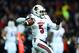 Dec 5, 2013; Cincinnati, OH, USA; Louisville Cardinals quarterback Teddy Bridgewater (5) throws a pass during the first quarter against the Cincinnati Bearcats at Nippert Stadium. Mandatory Credit: Andrew Weber-USA TODAY Sports