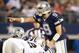 Nov 28, 2013; Arlington, TX, USA; Dallas Cowboys quarterback Tony Romo (9) points at the Oakland Raiders defense during a NFL football game on Thanksgiving at AT&T Stadium. Dallas beat Oakland 31-24. Mandatory Credit: Tim Heitman-USA TODAY Sports
