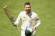 ADELAIDE, AUSTRALIA - DECEMBER 06: Michael Clarke of Australia acknowledges the crowd as he walks off the ground after he was dismissed during day two of the Second Ashes Test Match between Australia and England at Adelaide Oval on December 6, 2013 in Adelaide, Australia. (Photo by Robert Cianflone/Getty Images)