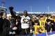 LEXINGTON, KY - NOVEMBER 9: Michael Sam #52 of the Missouri Tigers celebrates with fans after the game against the Kentucky Wildcats at Commonwealth Stadium on November 9, 2013 in Lexington, Kentucky. Missouri won 48-17. (Photo by Joe Robbins/Getty Images)