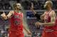 Nov 27, 2013; Auburn Hills, MI, USA; Chicago Bulls center Joakim Noah (13) and power forward Taj Gibson (22) celebrate during the fourth quarter against the Detroit Pistons at The Palace of Auburn Hills. Bulls beat the Pistons 99-79. Mandatory Credit: Raj Mehta-USA TODAY Sports