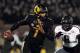 Nov 30, 2013; Columbia, MO, USA; Missouri Tigers quarterback James Franklin (1) runs the ball as Texas A&M Aggies linebacker Steven Jenkins (8) attempts the tackle during the first half of the game at Faurot Field. Mandatory Credit: Denny Medley-USA TODAY Sports