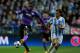 MALAGA, SPAIN - MARCH 13: Jackson Martinez (L) of FC Porto competes for the ball with Martin Demichelis (R) of Malaga CF during the UEFA Champions League Round of 16 second leg match between Malaga CF and FC Porto at La Rosaleda Stadium on March 13, 2013 in Malaga, Spain. (Photo by Gonzalo Arroyo Moreno/Getty Images)