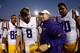 BATON ROUGE, LA - NOVEMBER 29: Quarterback Zach Mettenberger #8 is congratulated by head Coach Les Miles of the LSU Tigers after defeating the Arkansas Razorbacks 31-27 at Tiger Stadium on November 29, 2013 in Baton Rouge, Louisiana. (Photo by Chris Graythen/Getty Images)