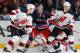 Eric Gelinas (far right) scored the game-winner in OT on Saturday for the Devils.