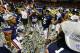 Dec 7, 2013; Atlanta, GA, USA; The Auburn Tigers play in confetti after defeating the Missouri Tigers in the 2013 SEC Championship game at Georgia Dome. Auburn won 59-42. Mandatory Credit: John David Mercer-USA TODAY Sports