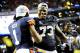 Dec 7, 2013; Atlanta, GA, USA; Auburn Tigers wide receiver Trovon Reed (1) and Auburn Tigers offensive linesman Greg Robinson (73) celebrate after the 2013 SEC Championship game against the Missouri Tigers at Georgia Dome. The Auburn Tigers defeated the Missouri Tigers 59-42. Mandatory Credit: Kevin Liles-USA TODAY Sports