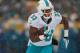 PITTSBURGH, PA - DECEMBER 08: Daniel Thomas #33 of the Miami Dolphins heads up field against the Pittsburgh Steelers in the second quarter at Heinz Field on December 8, 2013 in Pittsburgh, Pennsylvania. (Photo by Gregory Shamus/Getty Images)