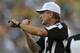 GREEN BAY, WI - SEPTEMBER 30: Referee Jeff Triplette #42 makes a personal foul call during a game between the Green Bay Packers and the New Orleans Saints at Lambeau Field on September 30, 2012 in Green Bay, Wisconsin. The Packers defeated the Saints 28-27. (Photo by Jonathan Daniel/Getty Images)