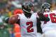 GREEN BAY, WI - DECEMBER 08: Matt Ryan #2 of the Atlanta Falcons passes against the Green Bay Packers at Lambeau Field on December 8, 2013 in Green Bay, Wisconsin. The Packers defeated the Falcons 22-21. (Photo by Jonathan Daniel/Getty Images)