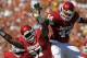 DALLAS - OCTOBER 02: Jeremy Beal #44 and Jamarkus McFarland #97 of the Oklahoma Sooners celebrate a quarterback sack against the Texas Longhorns in the first quarter at the Cotton Bowl on October 2, 2010 in Dallas, Texas. (Photo by Ronald Martinez/Getty Images)