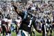 Dec 1, 2013; Charlotte, NC, USA; Carolina Panthers quarterback Cam Newton (1) celebrates after a touchdown during the game against the Tampa Bay Buccaneers at Bank of America Stadium. Mandatory Credit: Sam Sharpe-USA TODAY Sports