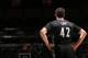 MINNEAPOLIS, MN - NOVEMBER 27: Kevin Love #42 of the Minnesota Timberwolves looks on during the game against the Denver Nuggets on November 27, 2013 at Target Center in Minneapolis, Minnesota. NOTE TO USER: User expressly acknowledges and agrees that, by downloading and or using this Photograph, user is consenting to the terms and conditions of the Getty Images License Agreement. Mandatory Copyright Notice: Copyright 2013 NBAE (Photo by David Sherman/NBAE via Getty Images)