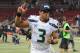 ST. LOUIS, MO - OCTOBER 28: Russell Wilson #3 of the Seattle Seahawks celebrates after defeating the St. Louis Rams, by the score of 14-9 at the Edward Jones Dome on October 28, 2013 in St. Louis, Missouri. (Photo by Michael Thomas/Getty Images)