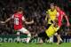 LONDON, ENGLAND - OCTOBER 22: Jakub Blaszczykowski of Borussia Dortmund tackles Aaron Ramsey of Arsenal during the UEFA Champions League Group F match between Arsenal and Borussia Dortmund at Emirates Stadium on October 22, 2013 in London, England. (Photo by Shaun Botterill/Getty Images)