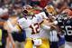 CLEVELAND, OH - DECEMBER 16: Quarterback Kirk Cousins #12 of the Washington Redskins throws a pass as he is pressured by linebacker Kaluka Maiava #56 of the Cleveland Browns at Cleveland Browns Stadium on December 16, 2012 in Cleveland, Ohio. (Photo by Matt Sullivan/Getty Images)