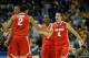 Nov 16, 2013; Milwaukee, WI, USA; Ohio State Buckeyes forward Marc Loving (2), guard Aaron Craft (4) and guard Shannon Scott (3) reacts after a Buckeye basket during the game against the Marquette Golden Eagles at BMO Harris Bradley Center. The Buckeyes beat the Golden Eagles 52-35. Mandatory Credit: Benny Sieu-USA TODAY Sports